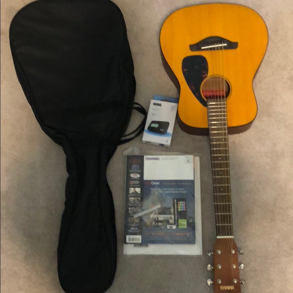Guitar,case,tuner,professional book, picks,cd,etc